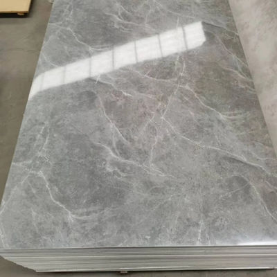 Pannello di parete in PVC a alta lucentezza impermeabile Veneer di marmo in pietra artificiale UV per la casa