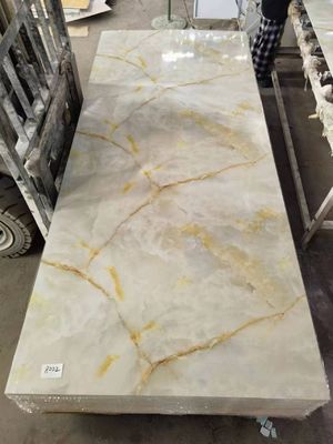 Pannello di parete in PVC a alta lucentezza impermeabile Veneer di marmo in pietra artificiale UV per la casa